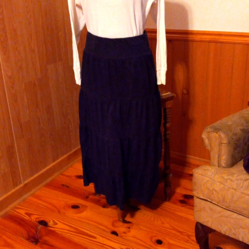 Layered long ruffled skirt.